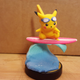 Illustration for article titled Pikachu Amiibo Learned Surf!
